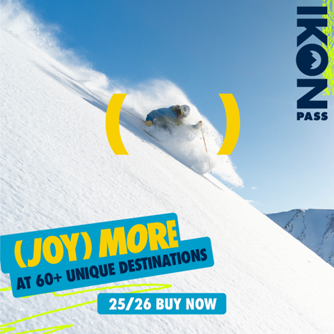 Skier going through fresh snow on a sunny day. Overlay copy reads: (Joy) More at 60+ unique destinations. 25/26 Buy Now. Ikon Pass.