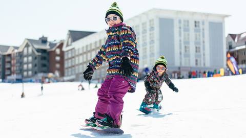 Kid Snowboarding