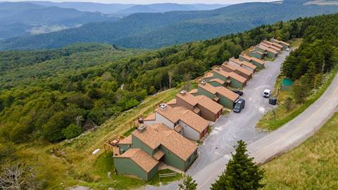 Aerial view of Land's End vacation rentals at Snowshoe Mountain, offering mountain top lodging with panoramic views and direct access to outdoor adventure
