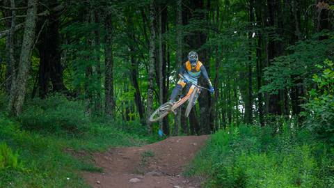 Rider hits step down on Pro DH