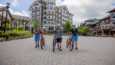 Mountain bikers in the village at snowshoe
