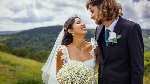 Bride and Groom during a Snowshoe Mountain Adventure Elopement