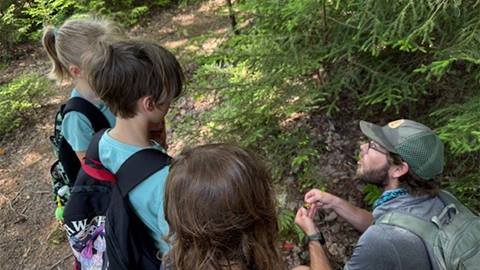 Instructor with kids at the Snowshoe Kids Summer Day Camp