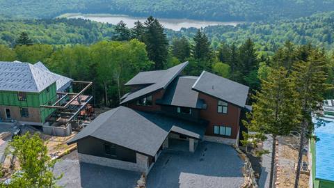 Aerial view of Red Spruce Vacation Home with scenic views of the lake | Snowshoe Mountain