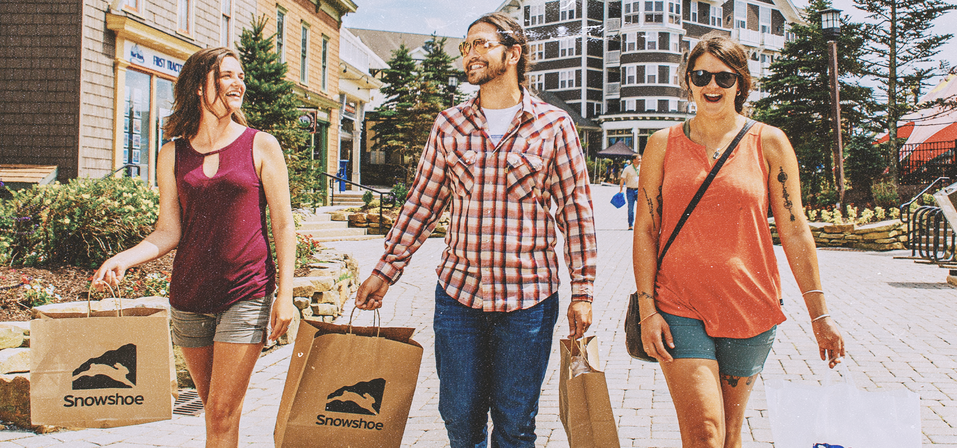 Friends shopping on a sunny day at Snowshoe Mountain