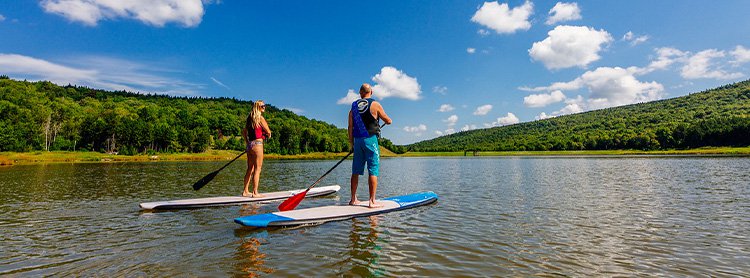 Paddleboarding on the lake at Snowshoe Mountain