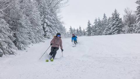 Couple Skiing at Snowshoe Mountain