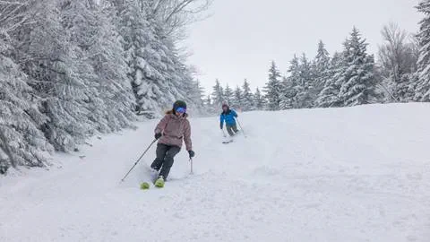 Couple Skiing at Snowshoe Mountain