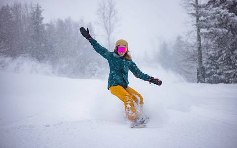 Snowboarder on slopes