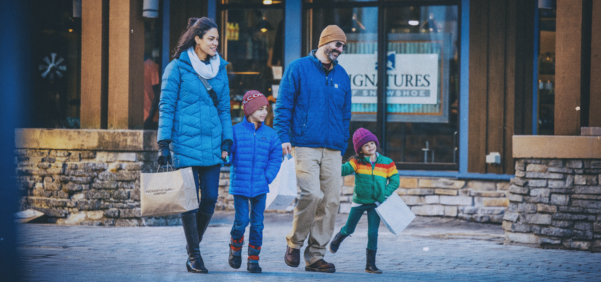 Friends shopping on a sunny day at Snowshoe Mountain