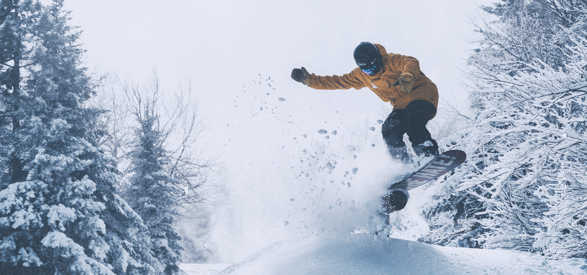 Snowboarder Catching Air at Snowshoe Mountain